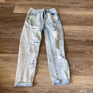 Gently worn, light wash high waisted mom style skinny jeans